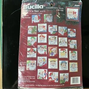 NWT Bucilla Santas of the World. 25 Counted Cross Stitch Ornaments Kit.